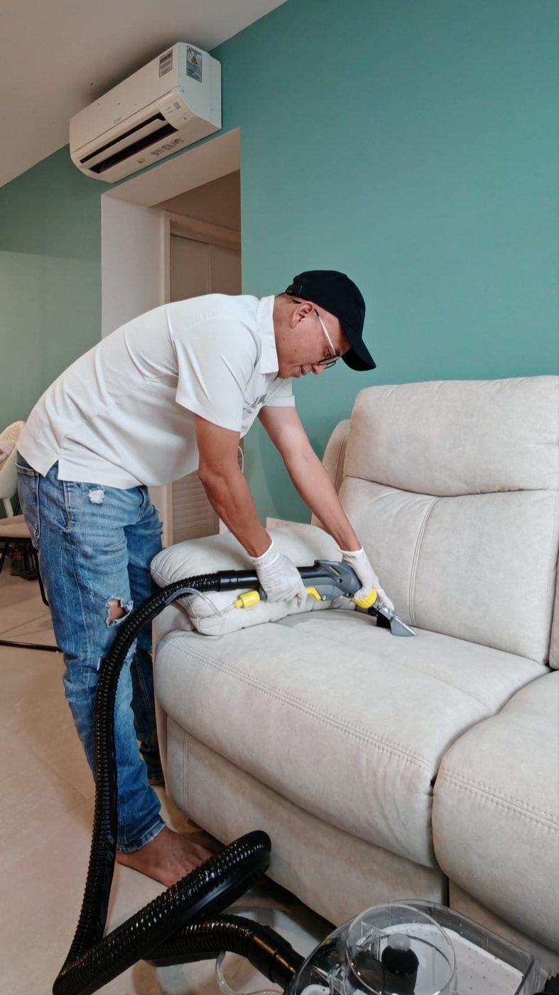 UltraRevive upholstery extraction cleaning on a sofa armrest in Singapore